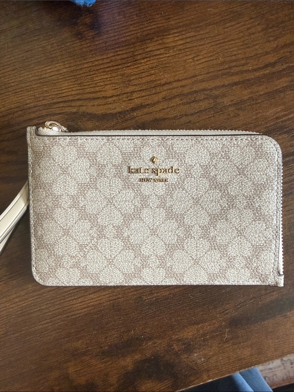 kate spade Neutral Patterned Wristlet Clutch with Gold Logo